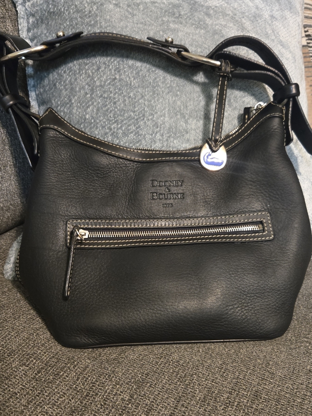 Dooney & Bourke Black Leather Shoulder Bag with Front Zip Pocket